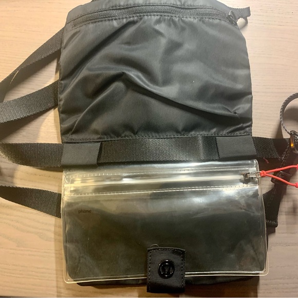 New no tags. Lululemon small Crossbody bag. 4 pockets. Clear phone pocket. - Picture 4 of 5